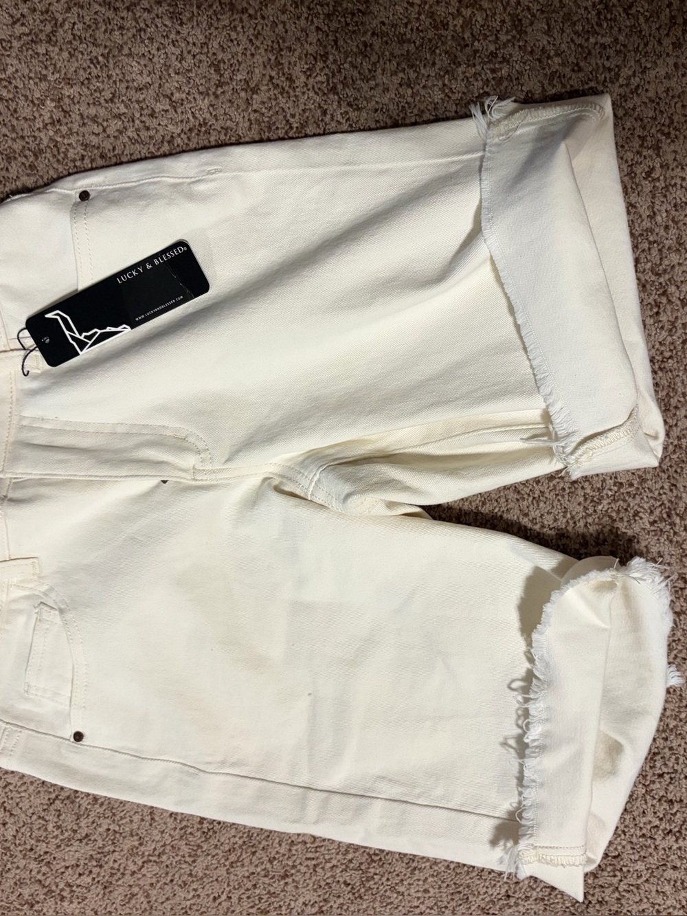 NWT Lucky & Blessed WHITE denim shorts size 4. With 28 waist